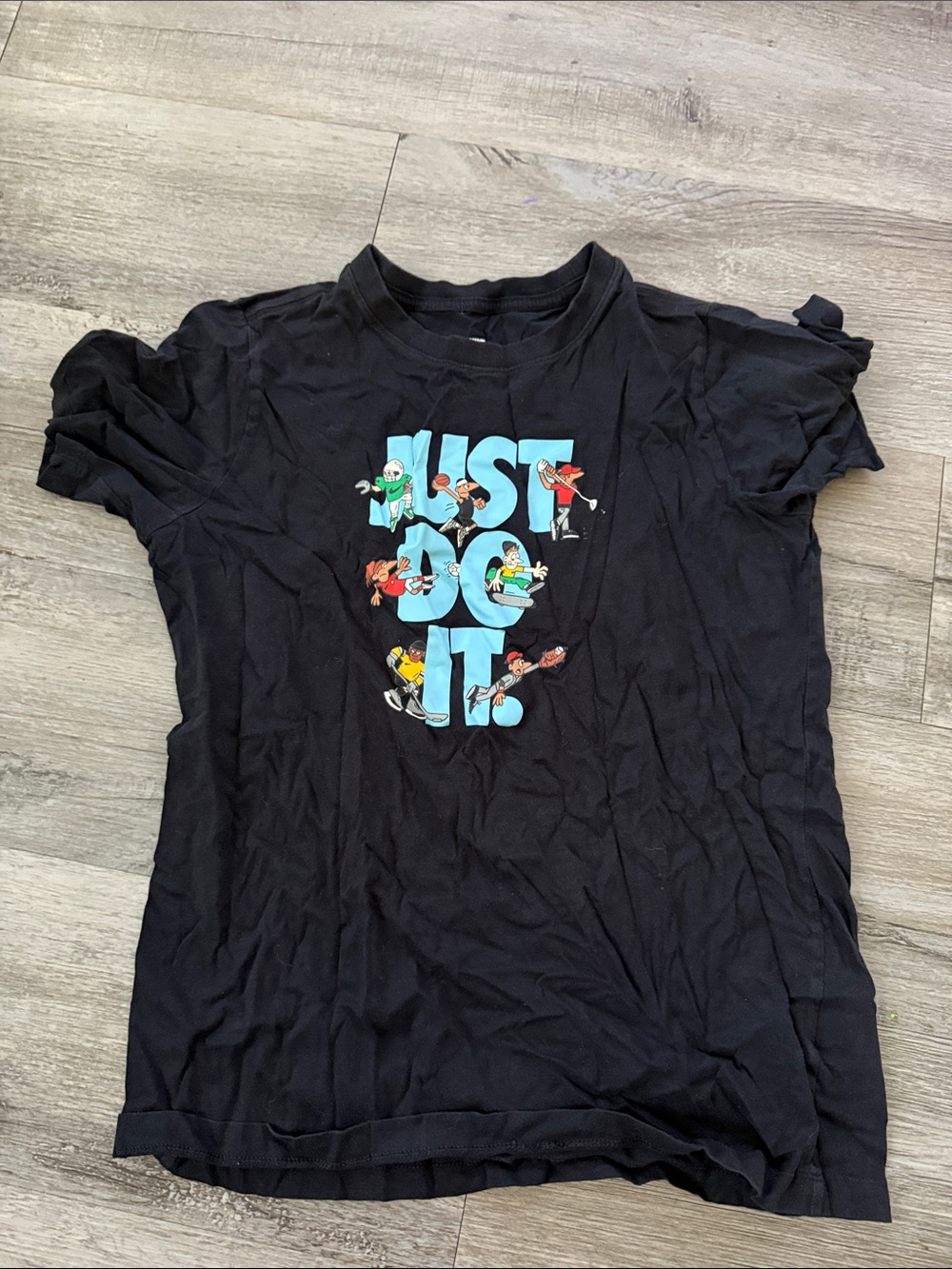 Nike Black 'Just Do It' Graphic Tee with Multicolor Characters